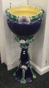 A Majolica jardiniere on stand