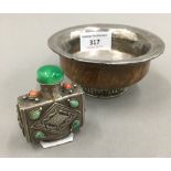A 19th century Tibetan silver and wood temple bowl and a 19th century Chinese square section silver