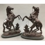A pair of bronze spelter Marley horses