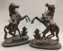 A pair of bronze spelter Marley horses