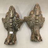 A large pair of Victorian ornately cast feet