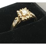 A 9 ct gold diamond set ring