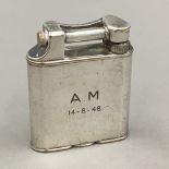 A mid 20th century Dunhill plated lighter