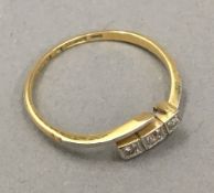 An 18 ct gold diamond ring