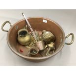 A large copper preserving pan,