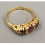 An 18 ct gold ruby and diamond set ring,