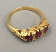 An 18 ct gold ruby and diamond set ring,