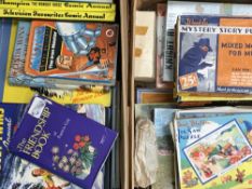 A quantity of children's books and jigsaw puzzles