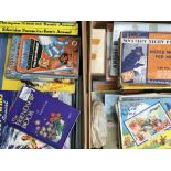 A quantity of children's books and jigsaw puzzles