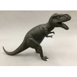 A bronze model of a Tyrannosaurus Rex