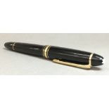 A Mont Blanc Meisterstuck 146 fountain pen With 14 ct nib. 14 cm long overall.