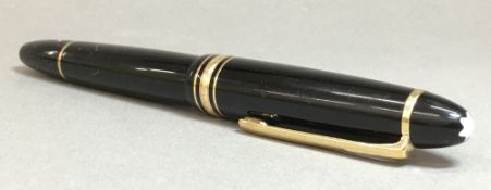 A Mont Blanc Meisterstuck 146 fountain pen With 14 ct nib. 14 cm long overall.