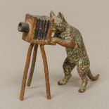 An Austrian cold painted bronze novelty figure Formed as a cat with a tripod bellows camera. 6.