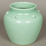 A Chinese Celadon porcelain vase With allover celadon glaze,