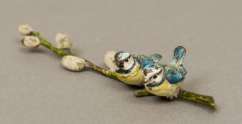 An early 20th century cold painted animalier group Formed as two Blue Tits sitting on a budding