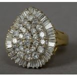 An unmarked gold and diamond cluster ring Of rounded heart form,