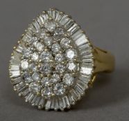 An unmarked gold and diamond cluster ring Of rounded heart form,