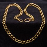 An 18 ct gold watch chain Of curb link design. 55.5 cm long.