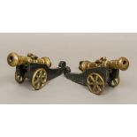 A pair of 17th century style bronze table cannons Each of typical form,