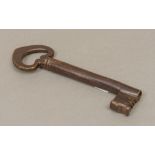 An Antique French chateau key 21.5 cm long.