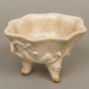 A Chinese crackle glaze pottery censer Of shaped organic form, with allover cream glaze,