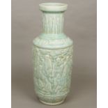 A large Chinese pottery vase Decorated in the round with deities and attendants amongst clouds,