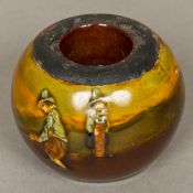 A Royal Doulton Kingsware Golfing Series ceramic match pot, circa 1910 Of typical squat ovoid form,