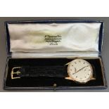 An 18 ct gold cased Longines gentleman's wristwatch The white dial with Arabic numerals,