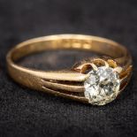 An 18 ct gold diamond solitaire ring The claw set stone spreading to approximately 1 carat.
