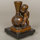 LOUIS-ERNEST BARRIAS (1841-1905) French Putto Lifting a Vase Patinated bronze, the vase signed,