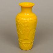 A large yellow ground Peking glass vase Decorated in the round with deities,