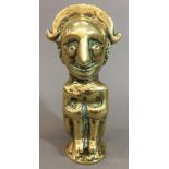 A Pre-Columbian Aztec type bronze figure Modelled seated with knees clenched,