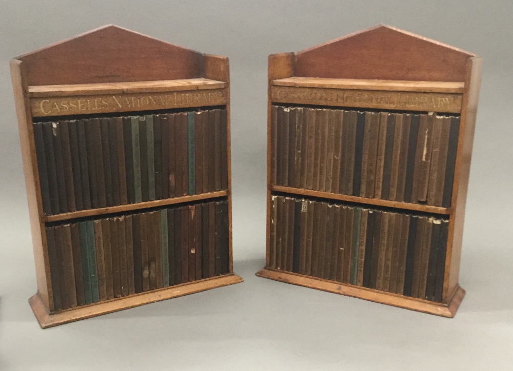 Cassell's National Library In two original bespoke wooden miniature display bookcases,