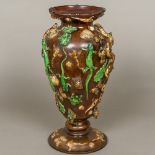 A 19th century Continental maiolica vase Decorated in the round with various lizards, frogs, fish,