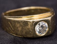 A gentleman's 14K gold diamond set signet ring The single stone spreading to approximately 0.