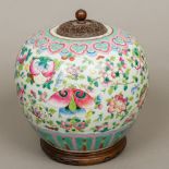 A 19th century Chinese famille rose porcelain ginger jar Decorated in the round with fruiting