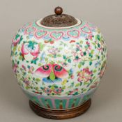 A 19th century Chinese famille rose porcelain ginger jar Decorated in the round with fruiting