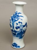 A 19th century Chinese blue and white porcelain vase Of flared slender bulbous form,