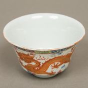 A 19th century Chinese porcelain bowl and cover Of circular section,