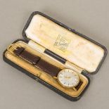 A 9 ct gold cased Tissot Seastar gentleman's wristwatch The silvered dial with batons. 3.5 cm wide.