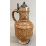 An early 17th century Raeren stoneware seven electors panel jug,