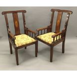 A pair of late Victorian/Edwardian inlaid mahogany and beech open armchairs Each crossbanded curved