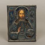 A 19th century Russian icon Painted as a priest with silver overlay,