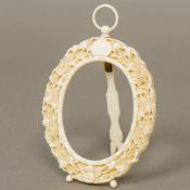 A late 19th century Canton carved ivory picture frame Carved with floral sprays and a vacant