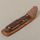 A vintage Bonsa Solingen folding multi-tooled pocket knife Of typical form,