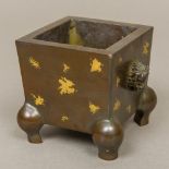 A Chinese patinated bronze "gold splash" censer Of tapering square section form,