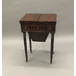 A 19th century mahogany work table The hinged folding top enclosing the lidded workbox,