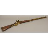 A late 19th/early 20th century British military flintlock musket by Lacy & Co The lock plate