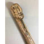 A 19th century Folk Art carved wood walking cane,