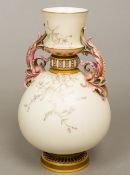 A 19th century Royal Worcester porcelain twin handled vase Typically worked on an ivory ground,